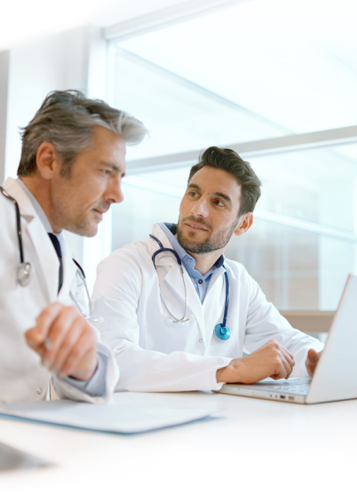 Two doctors in a meeting.